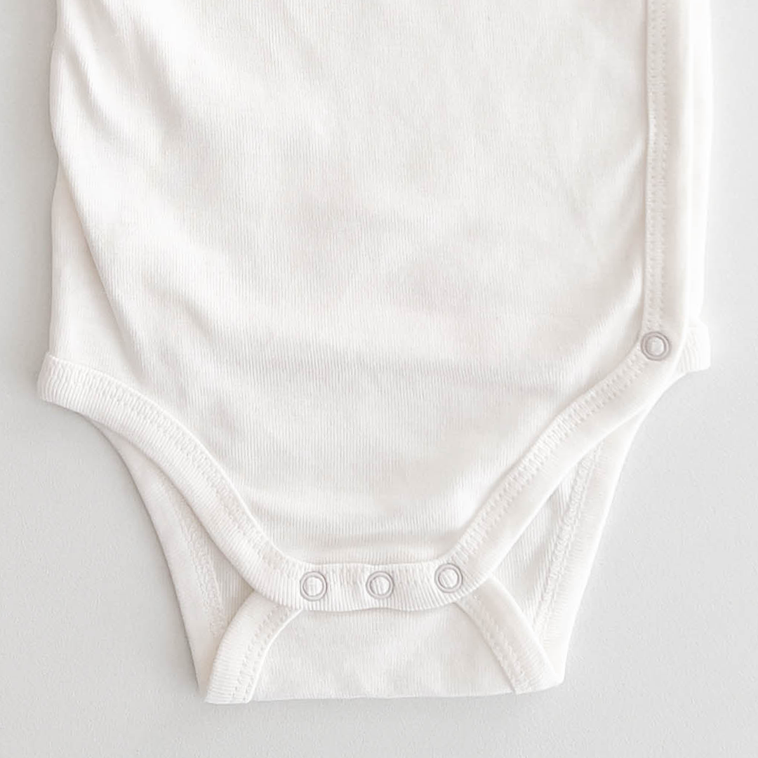 WHITE WRAP ONESIE