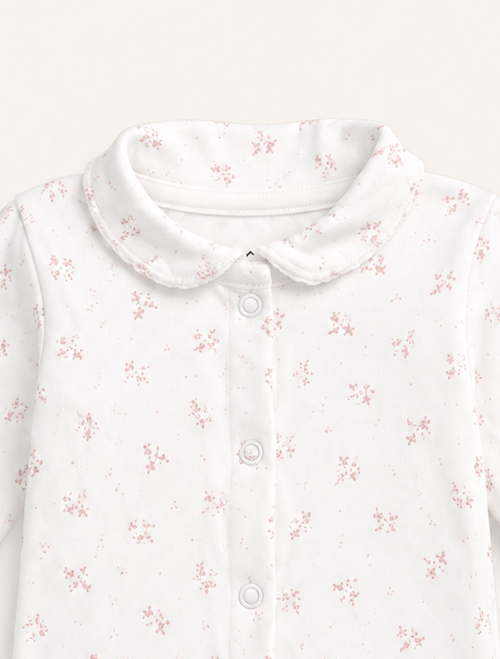 White floral patterned onesie