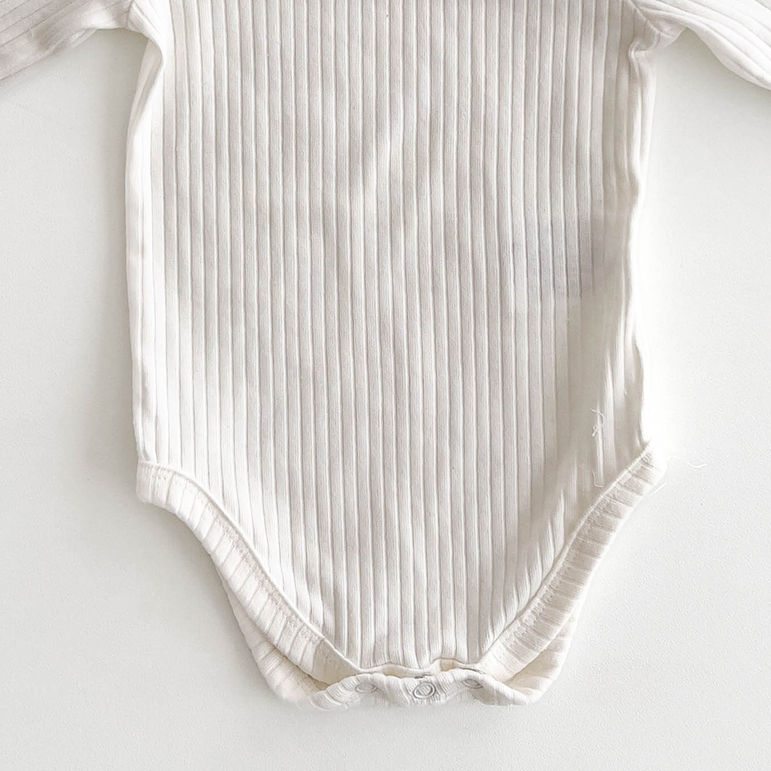 WHITE RIBBED COTTON ONESIE