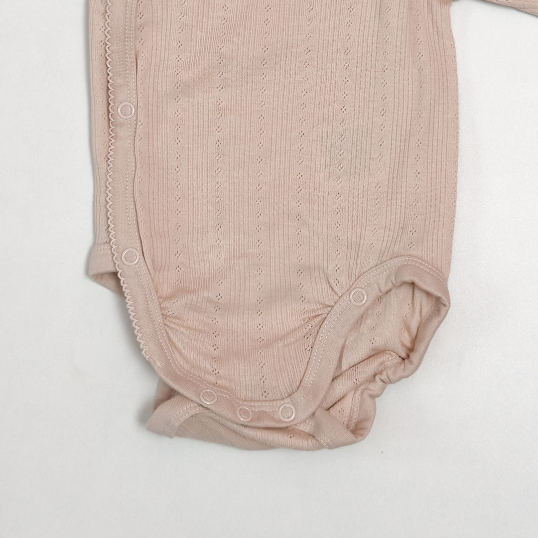 POINTELLE WRAPOVER RUFFLE ONESIE