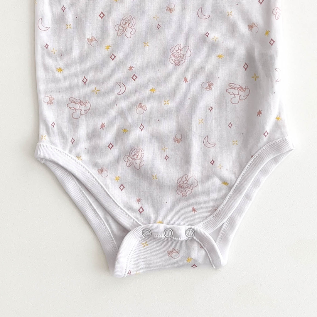 DISNEY WHITE PATTERNED ONESIE