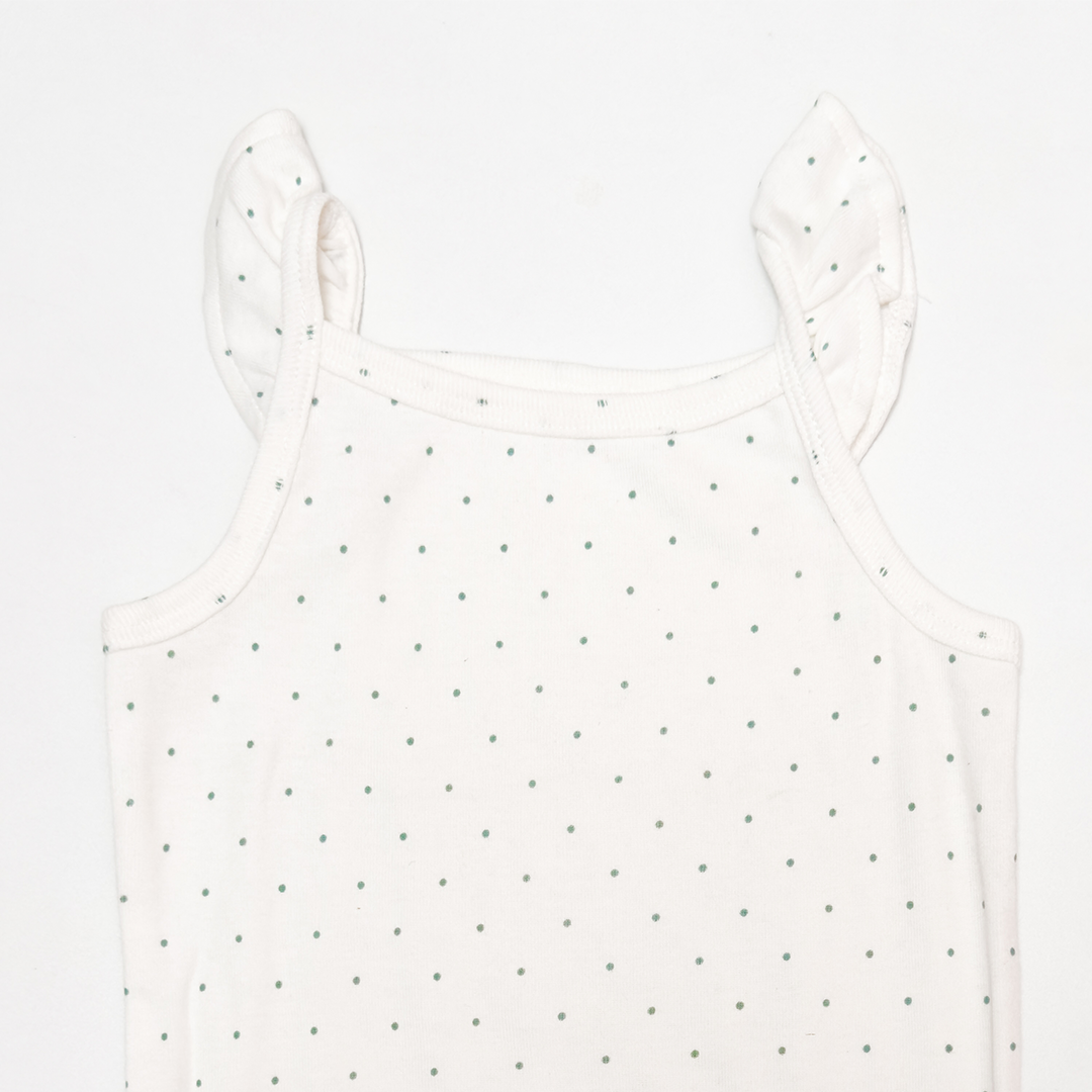 WHITE POLKA DOTTED ONESIE