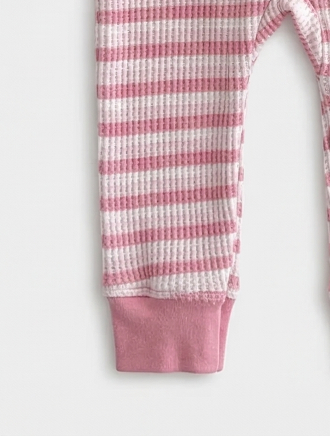 Pink striped ribbed material romper