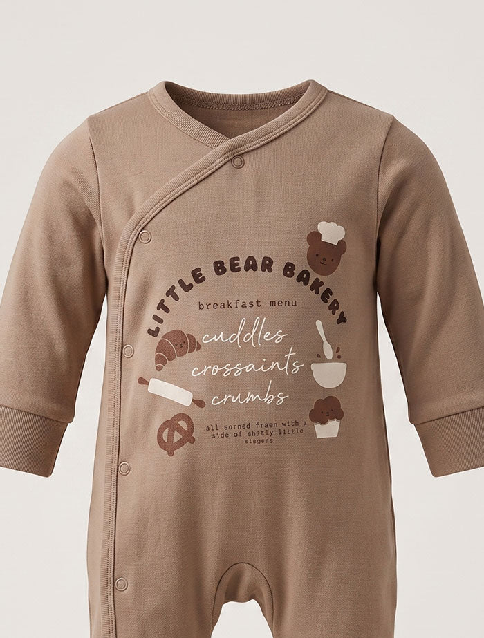 Light brown bakery wrap over sleep suit