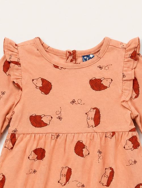 ORANGE PRINTED RUFFLE ONESIE