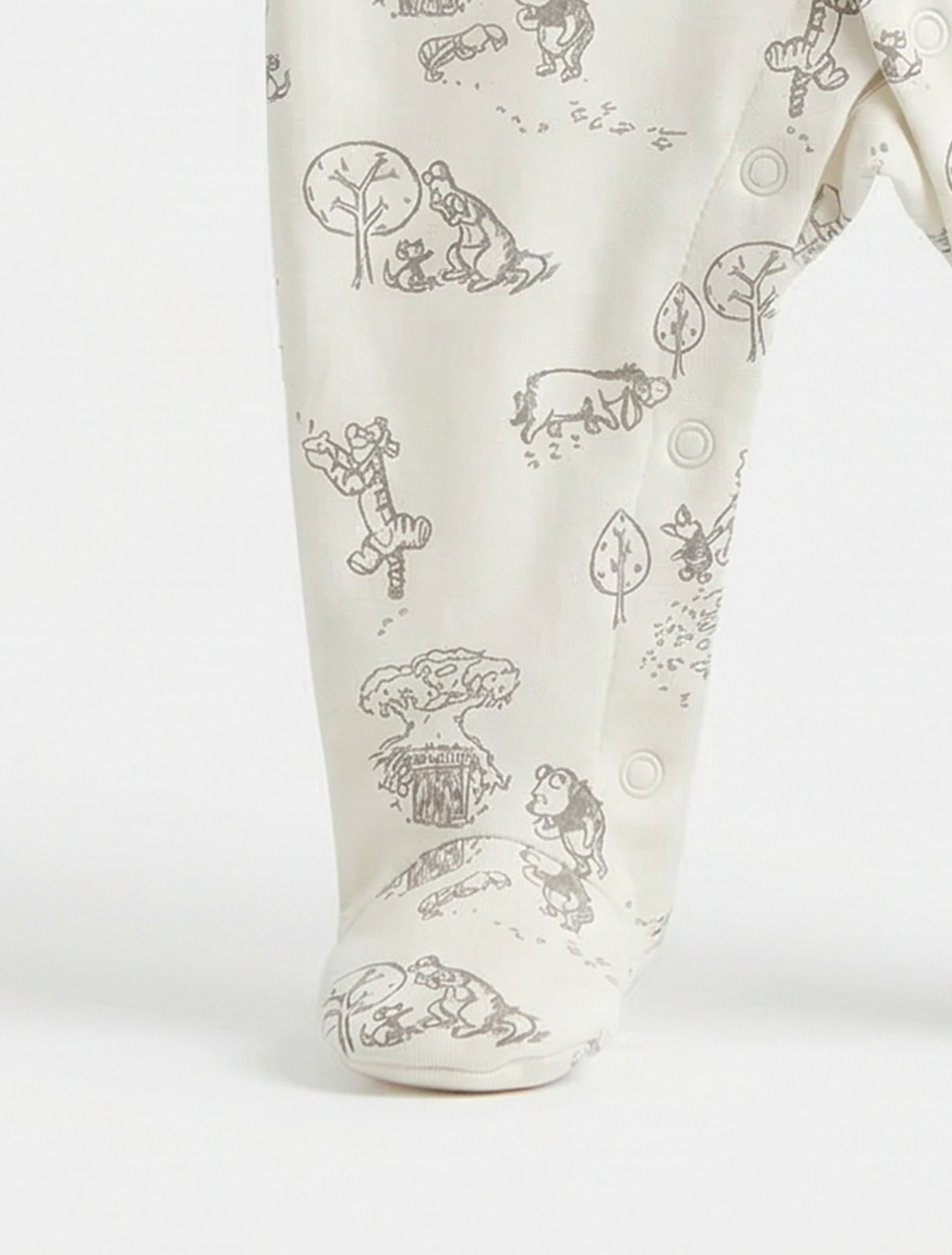 WHITE PRINTED BUTTON SLEEPSUIT