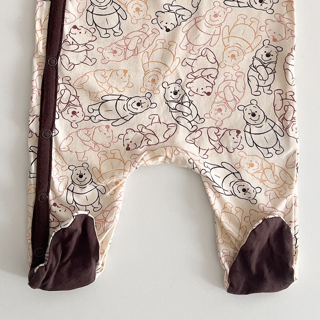 Beige and brown patterned sleepsuit
