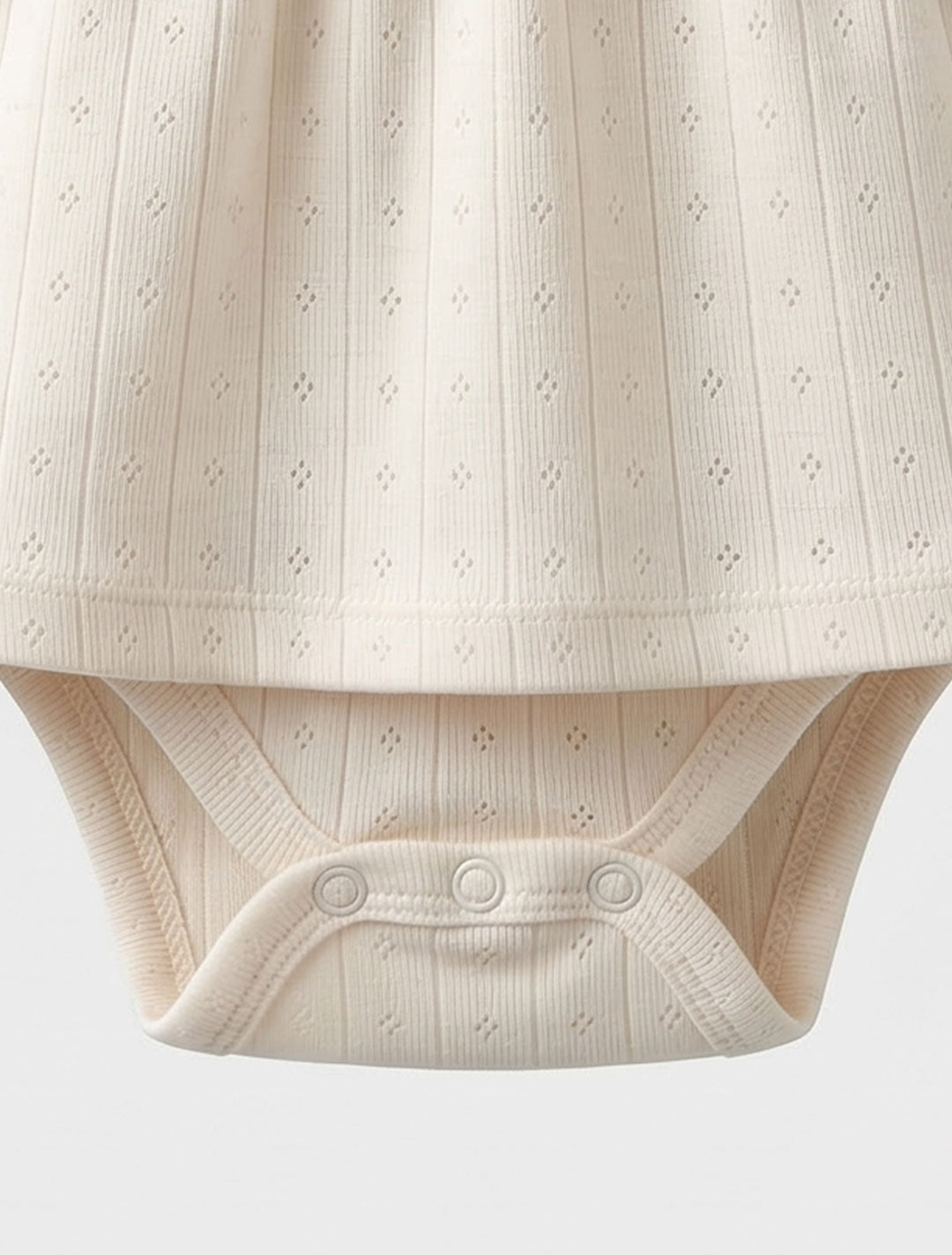 OFF WHITE KNITTED RUFFLED POINTELLE SUNSUIT