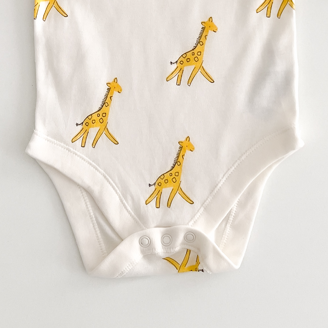 YELLOW giraffe PRINTED ONESIE