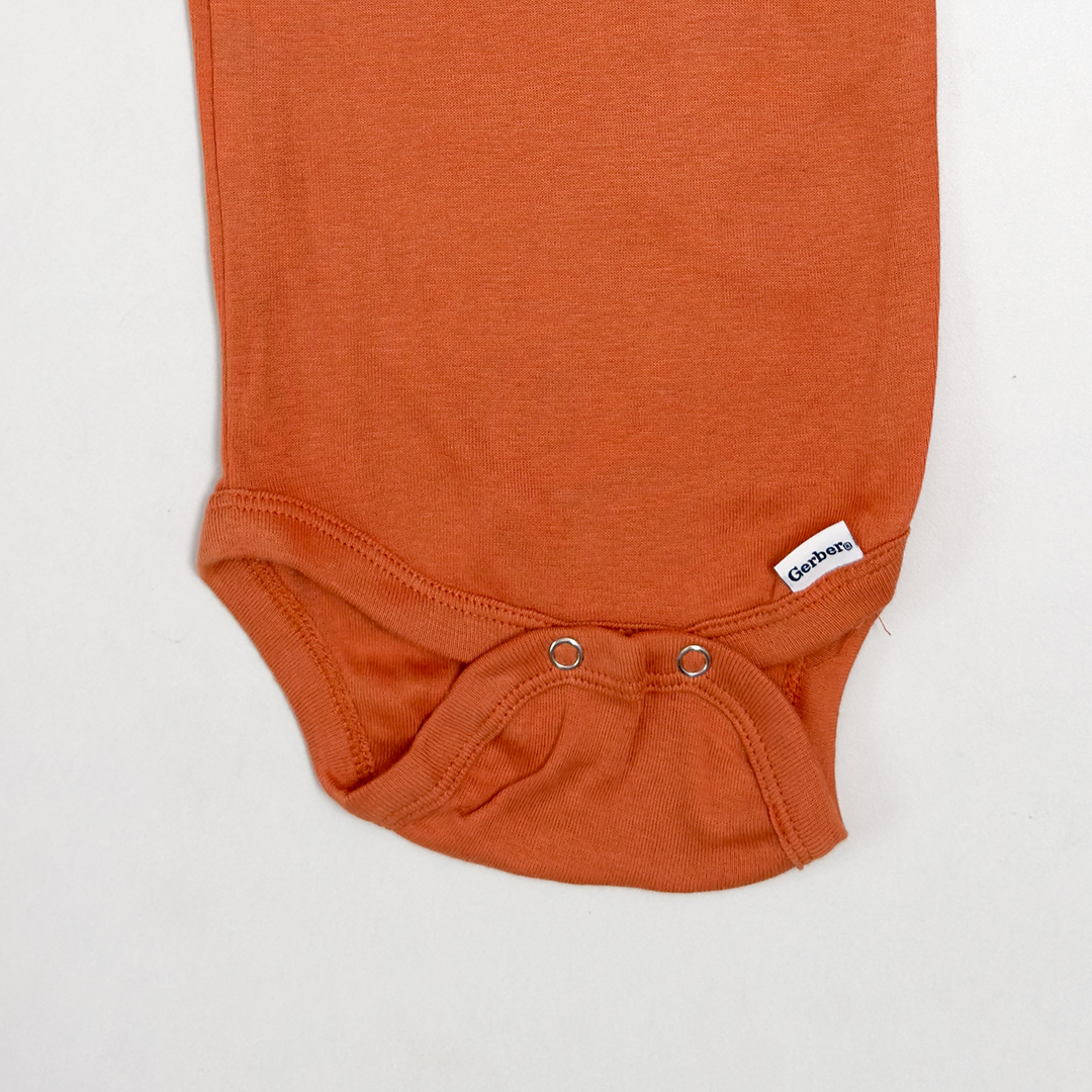 BURNT ORANGE SUN ONESIE
