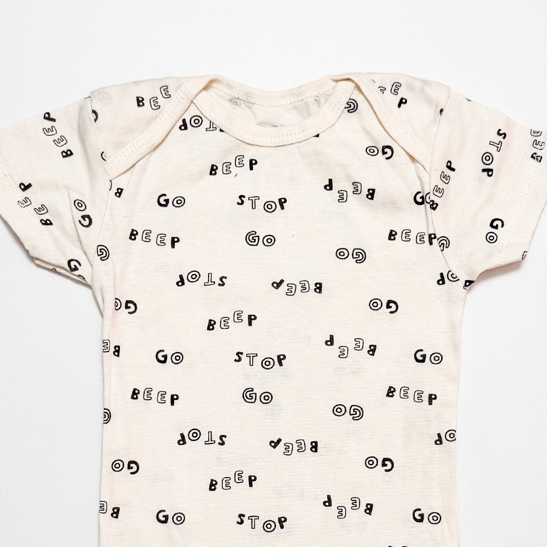 OFF WHITE PRINTED ONESIE