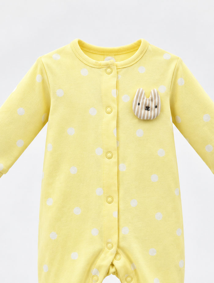 Yellow dotted button sleep suit