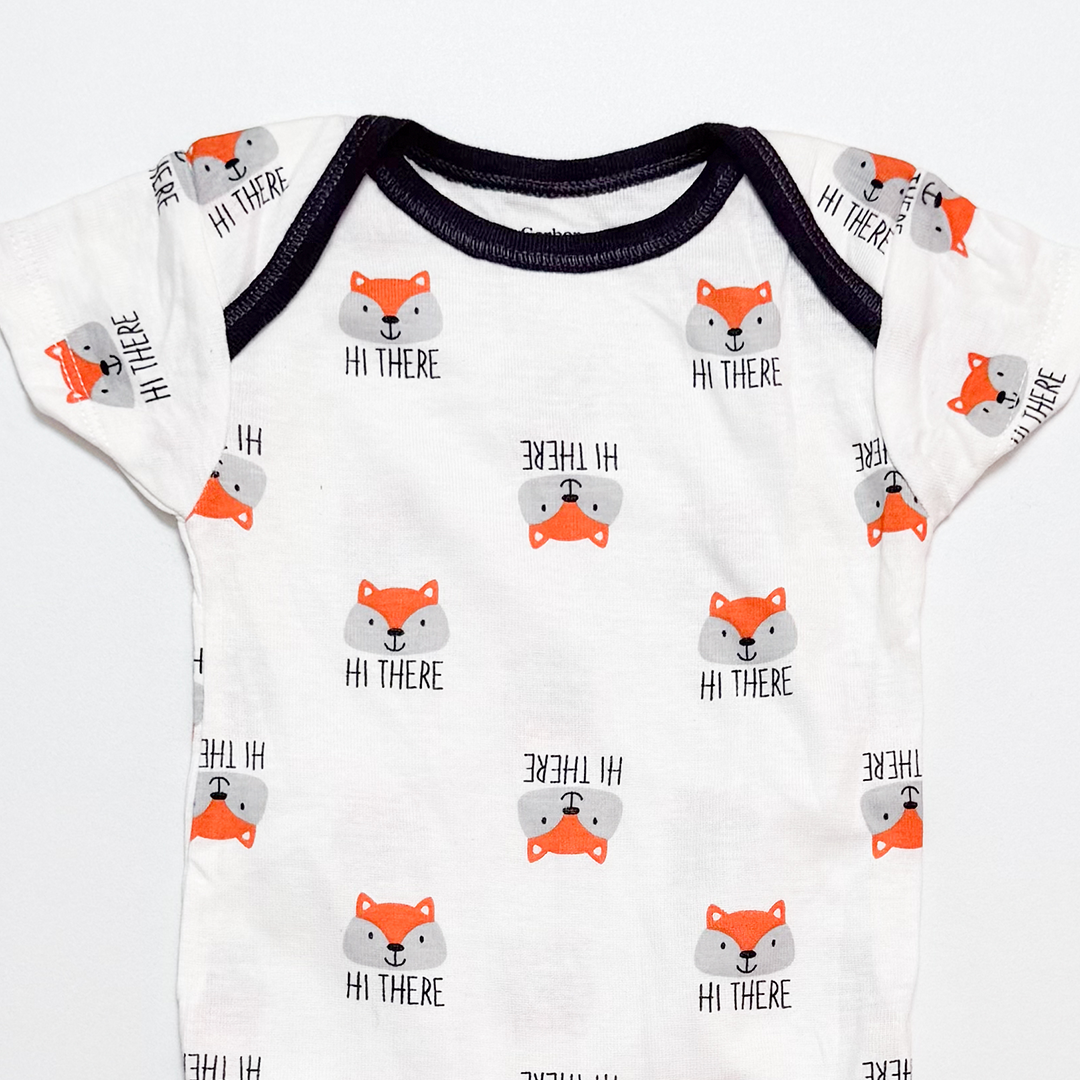 WHITE PATTERNED ONESIE