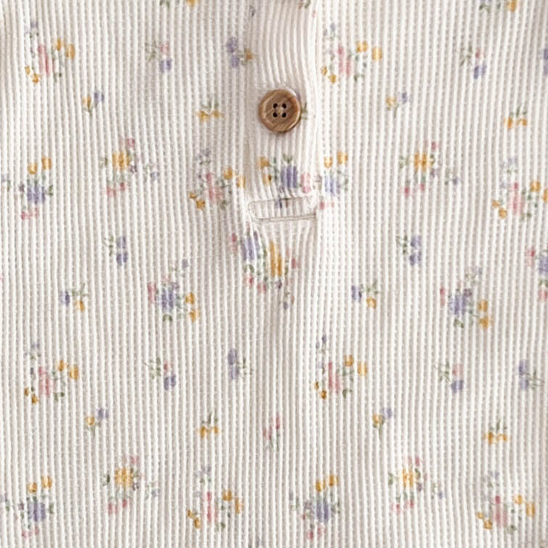 RIBBED KNIT FLORAL ROMPER