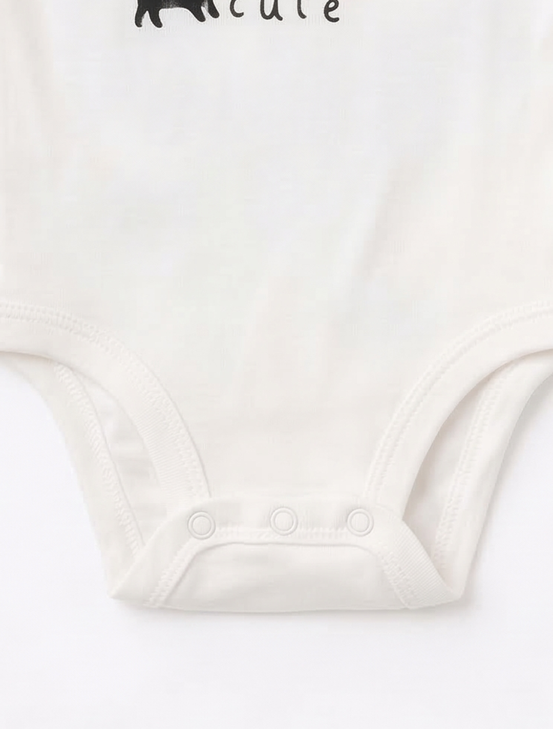 WHITE PRINTED RUFFLED ONESIE