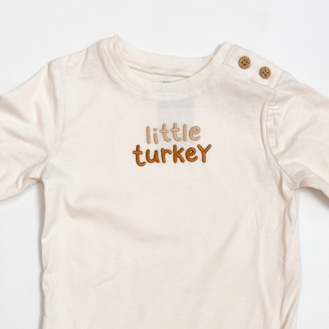 BEIGE LITTLE TURKEY ONESIE