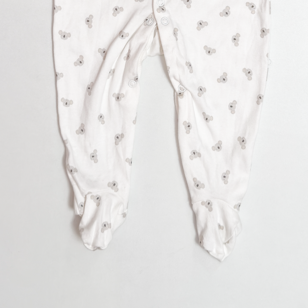 ANIMAL PRINTED WHITE SLEEPSUIT