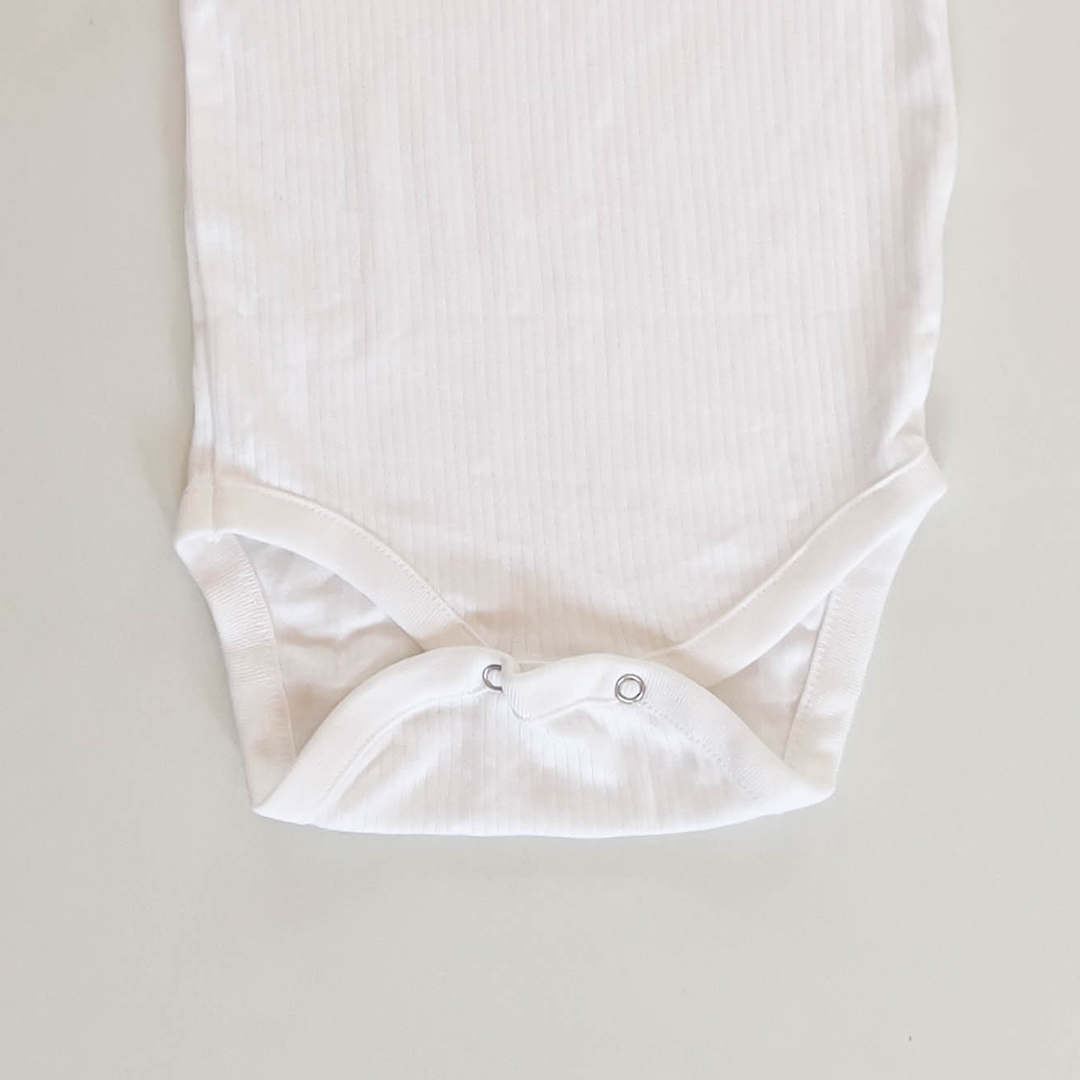 WHITE RIBBED SPAGHETTI STRAP ONESIE