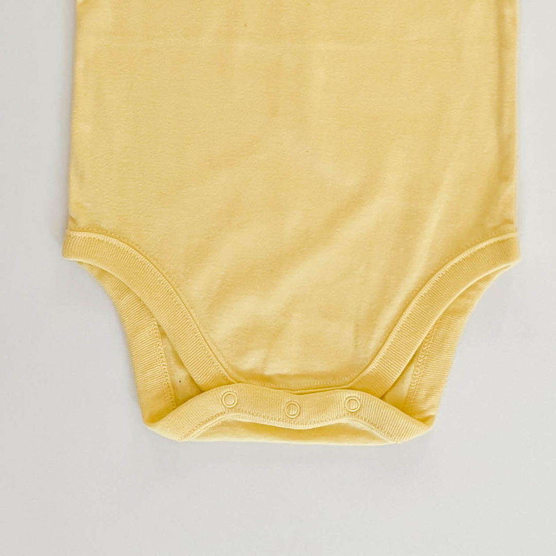 YELLOW UNICORN PRINT ONESIE