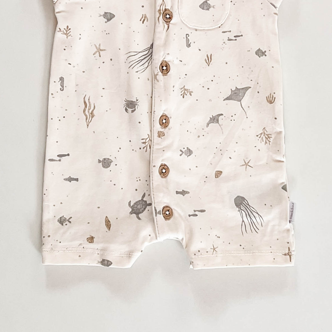 IVORY OCEAN PRINTED JUMPSUIT