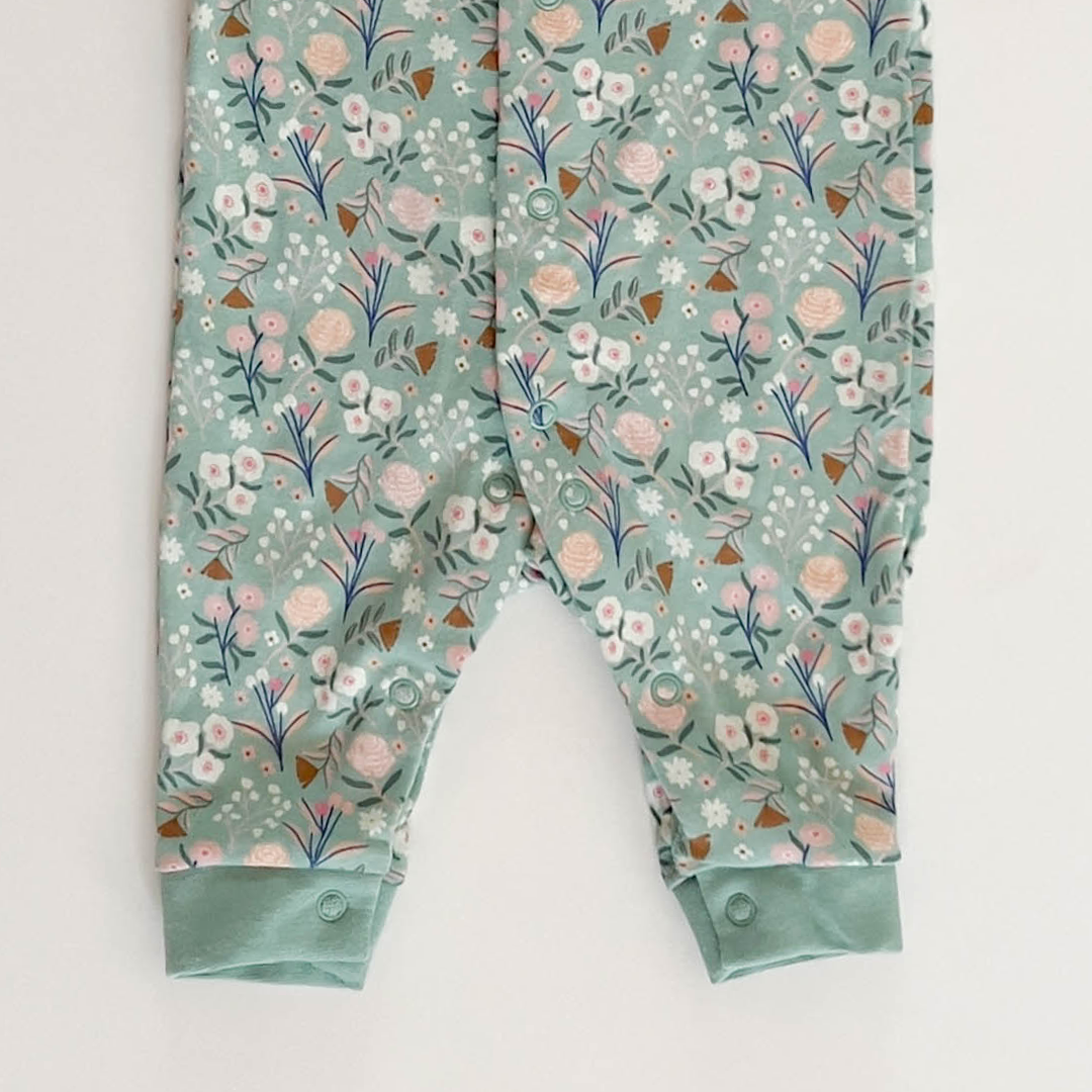 VEGAN FLORAL RUFFLED ROMPER
