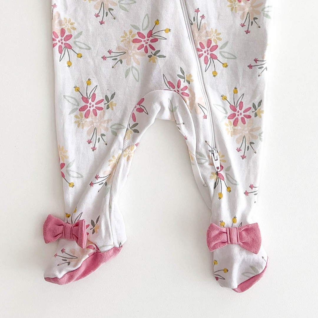 PINK FLORAL RUFFLED SLEEPSUIT