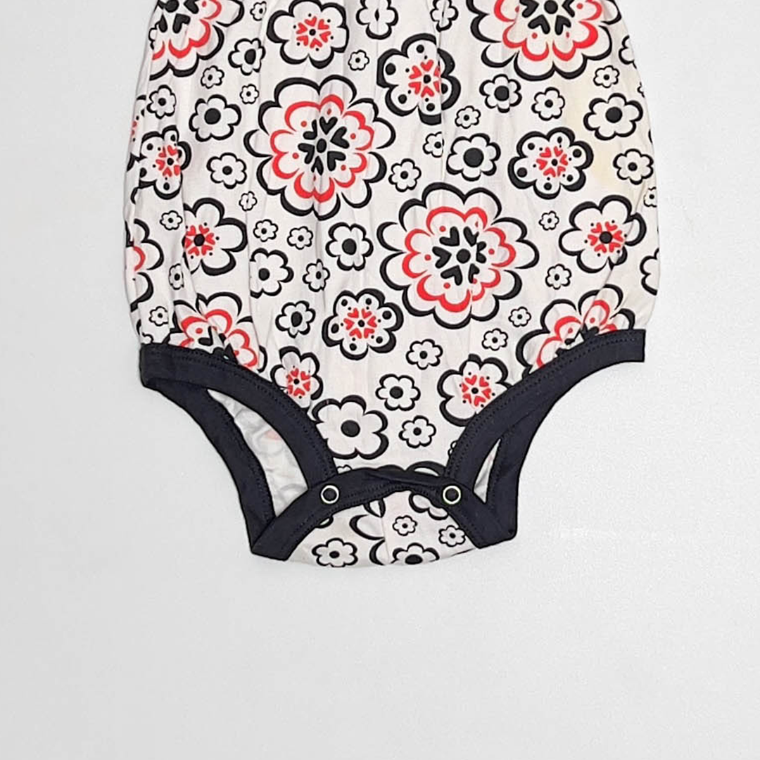BLACK AND WHITE FLORAL ONESIE