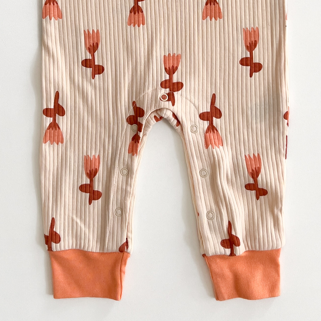 Unisex orange and beige romper