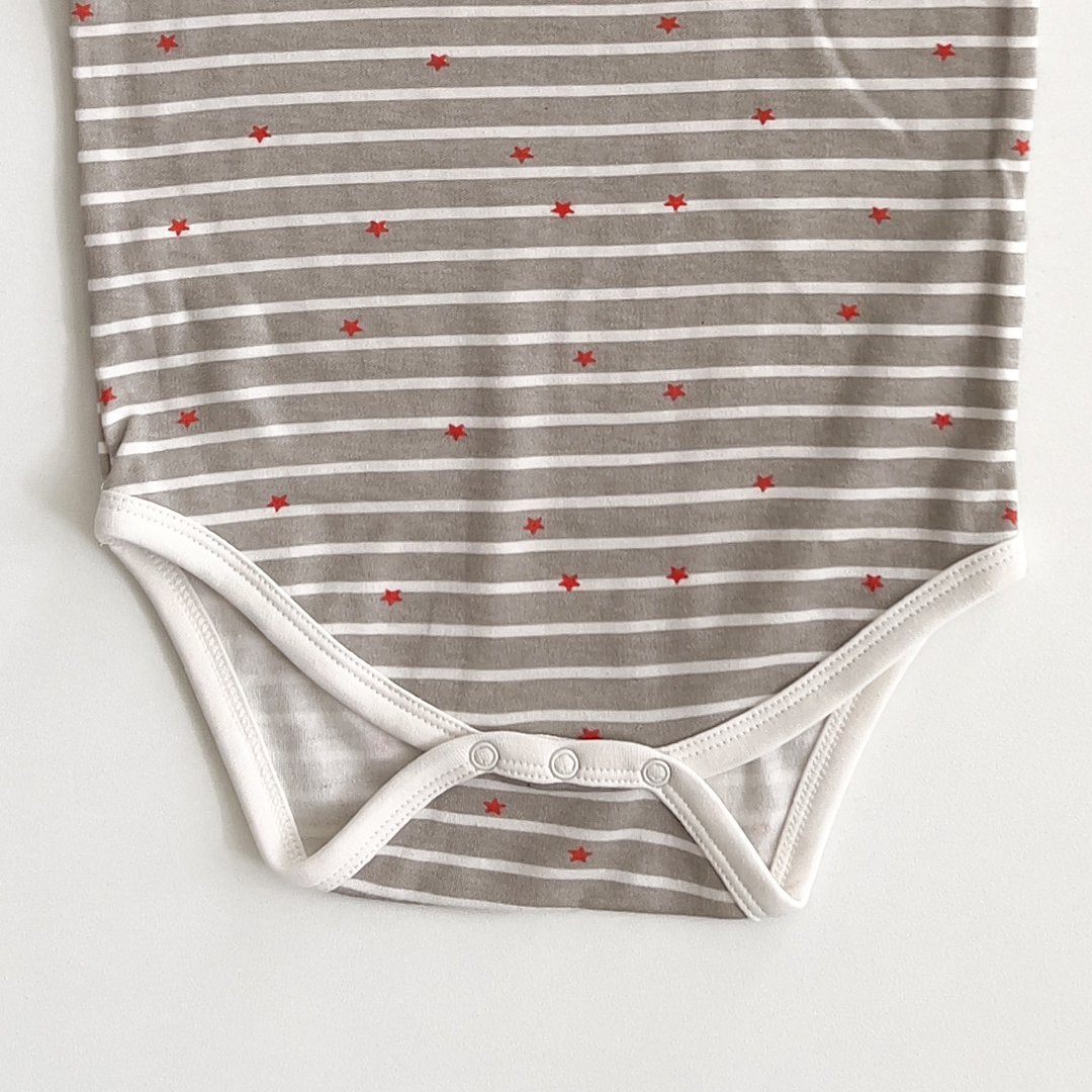 grey and white striped star print onesie