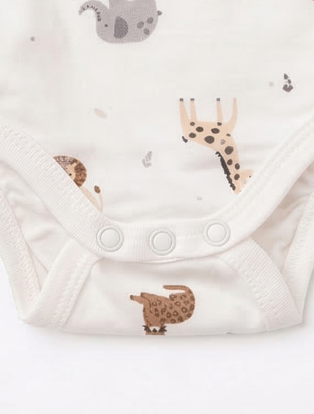 WHITE ANIMAL PRINTED ONESIE
