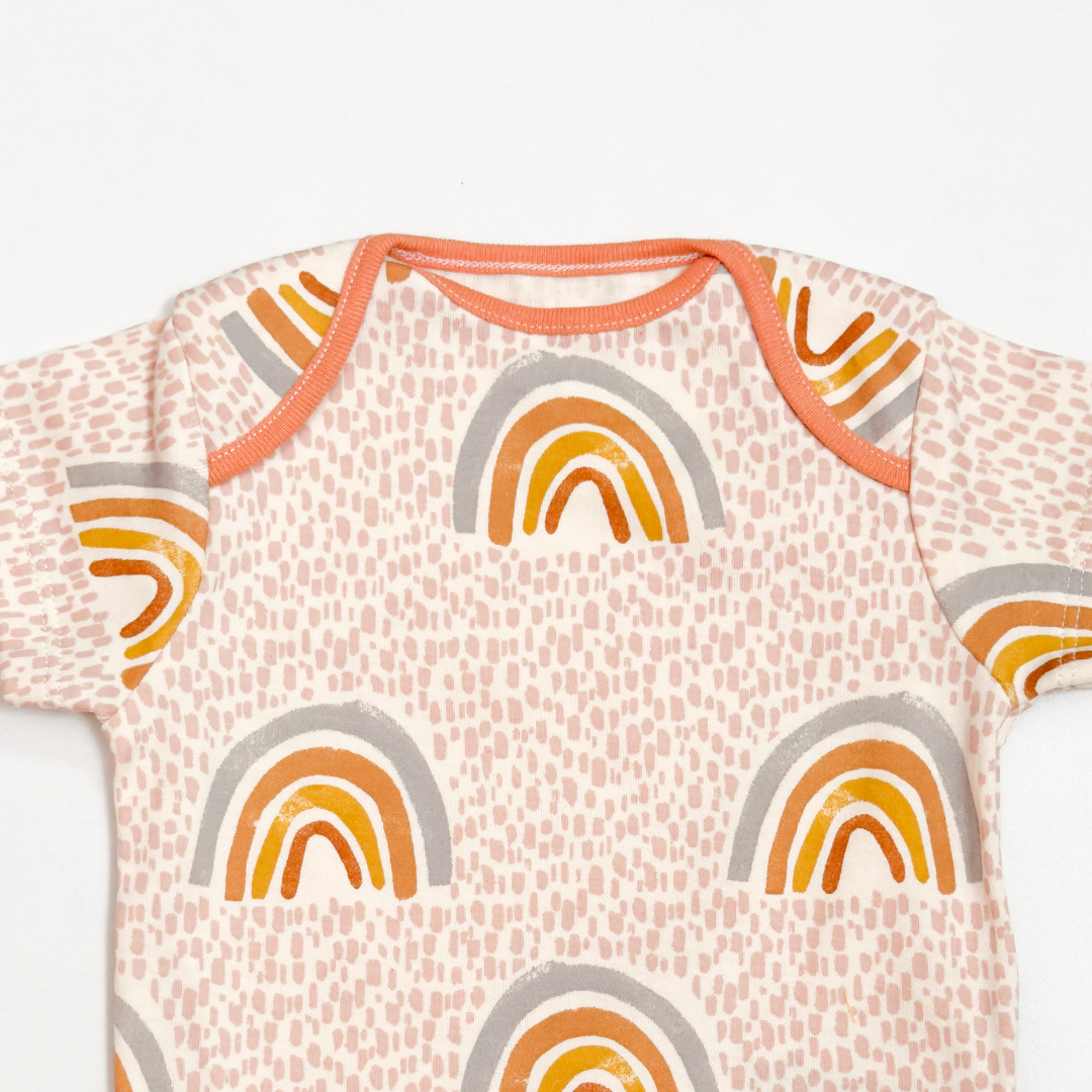 BEIGE RAINBOW PRINTED ONESIE