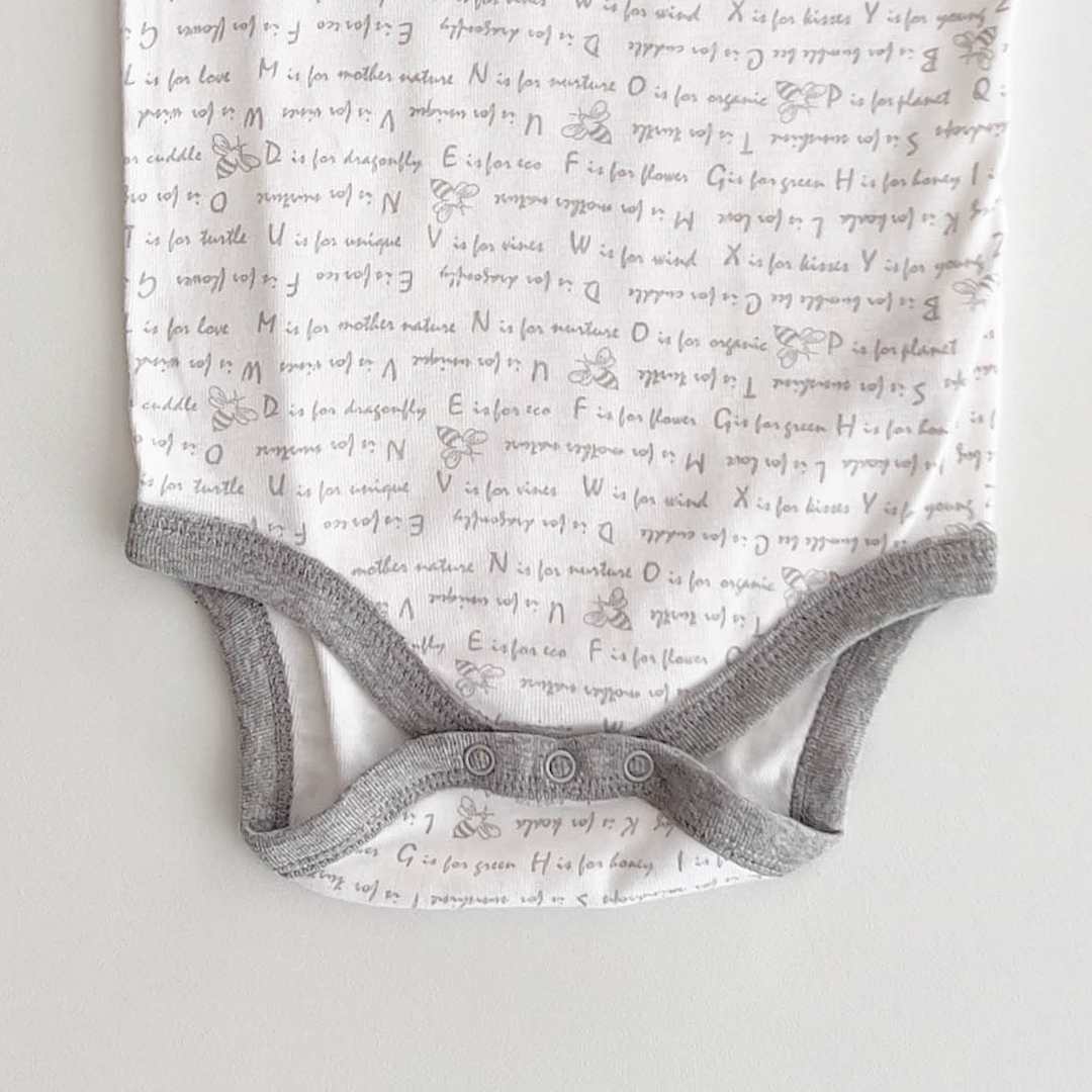 WHITE PATTERNED ONESIE