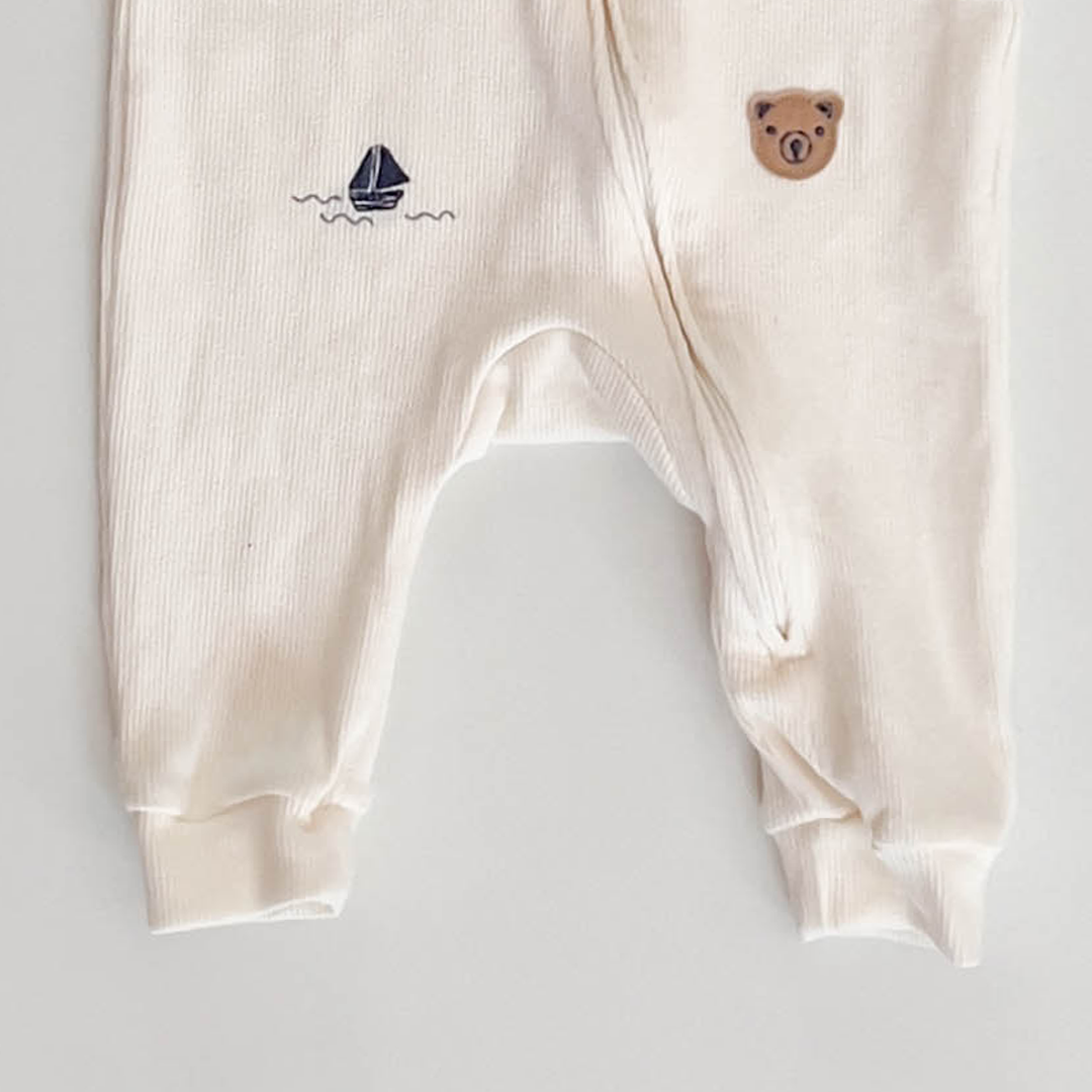 WHITE PATTERNED RIBBED ZIPPER ROMPER