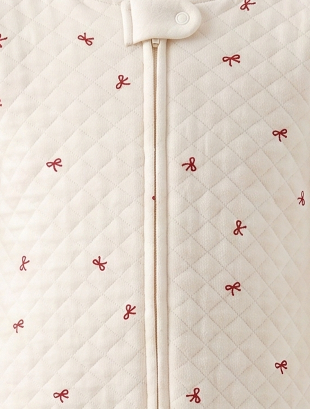 RED BOW QUILTED COTTON SLEEPSUIT