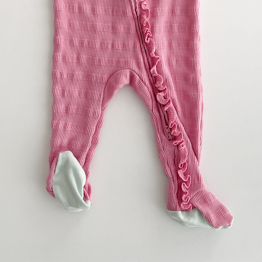 PINK RUFFLE ZIP SLEEPSUIT