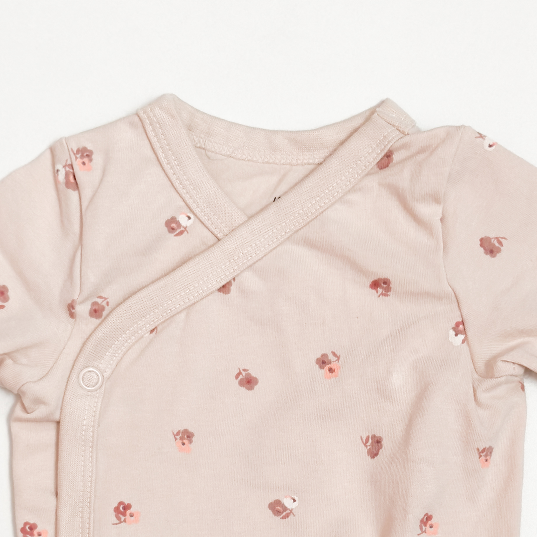 BEIGE FLORAL WRAPOVER ONESIE