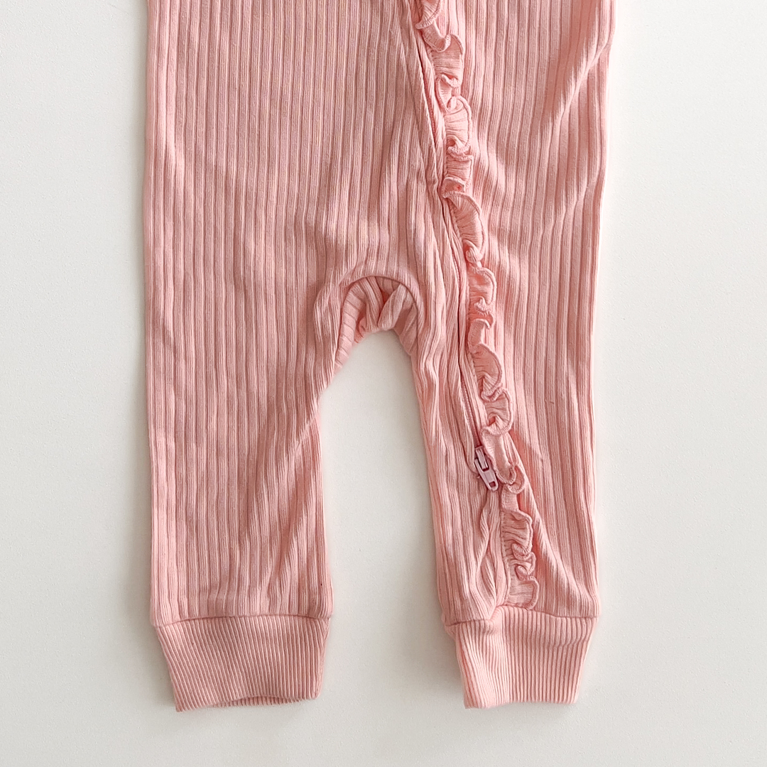 peach ribbed ruffles on front romper