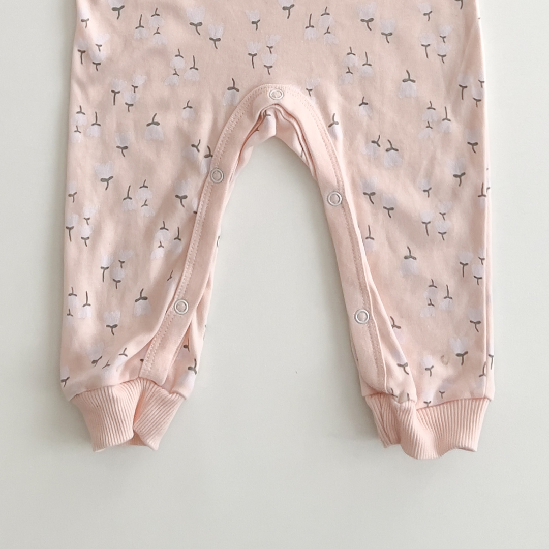 light peach floral patterned romper
