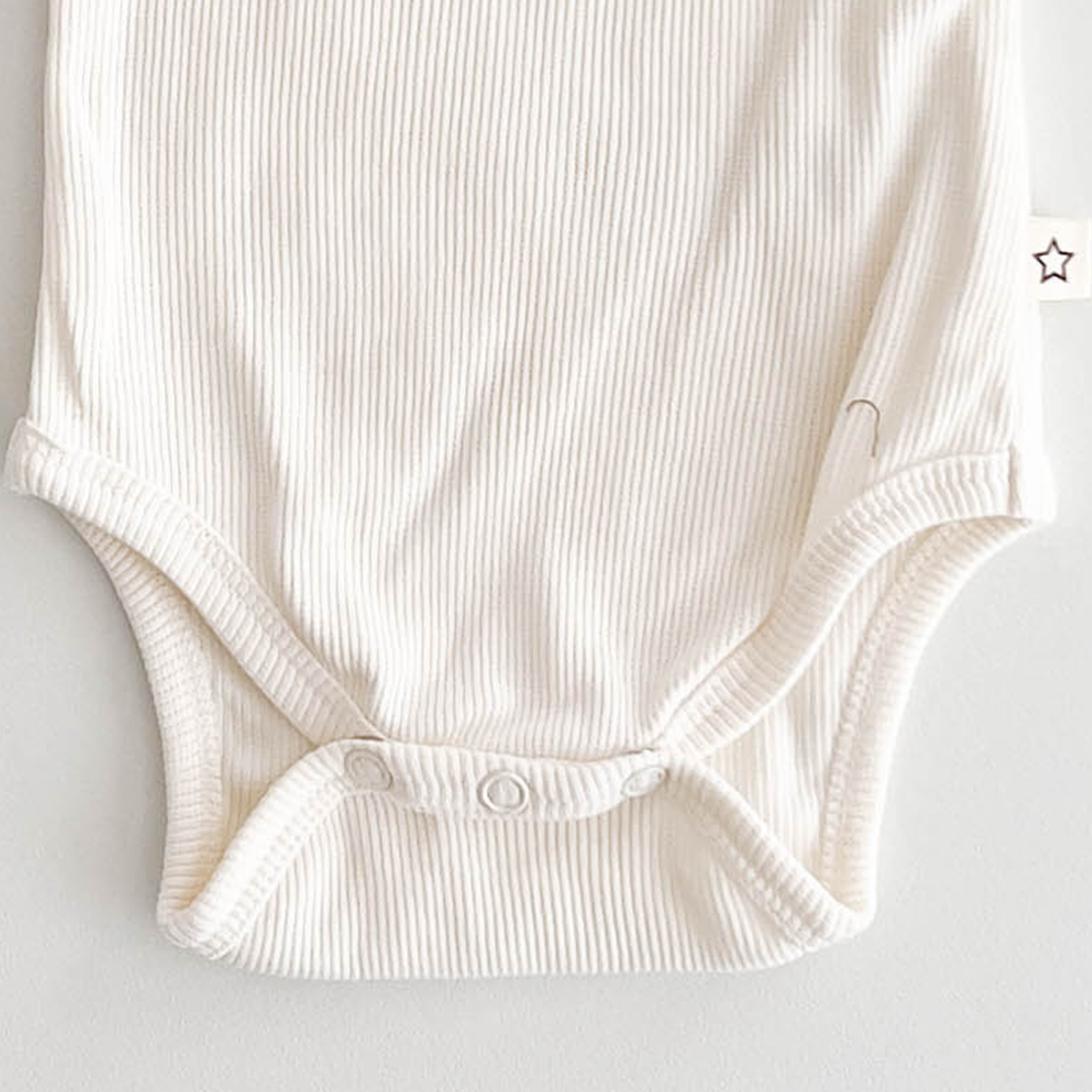WHITE RIBBED FANCY ONESIE