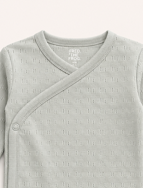 Sage green pointelle wrapover onesie