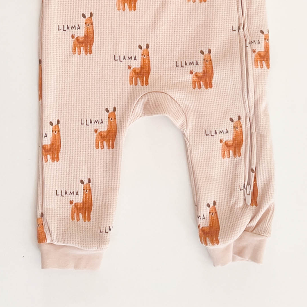 BEIGE LLAMA PRINTED KNITTED ROMPER
