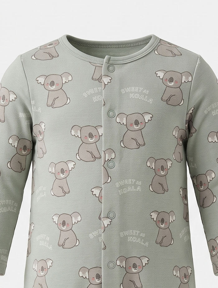 Pastel green printed button sleepsuit