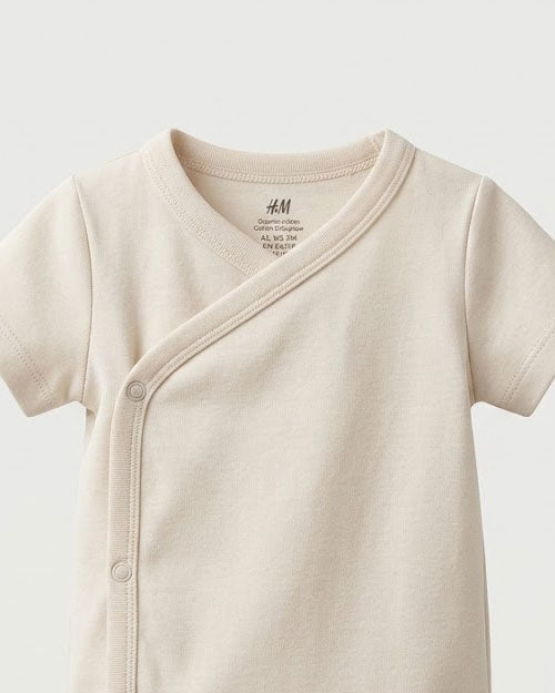 Off white wrapover onesie