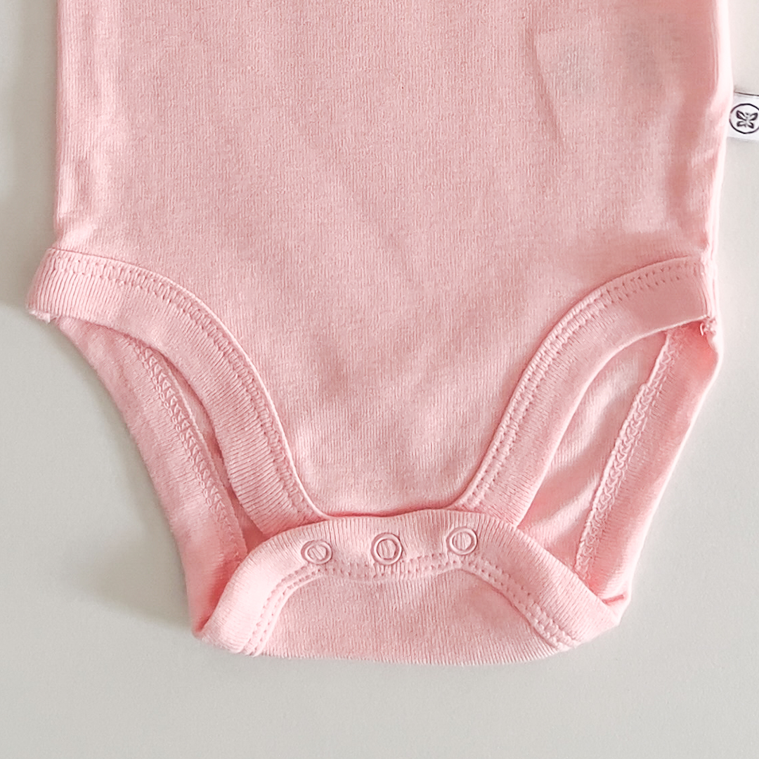 Pink coloured onesie