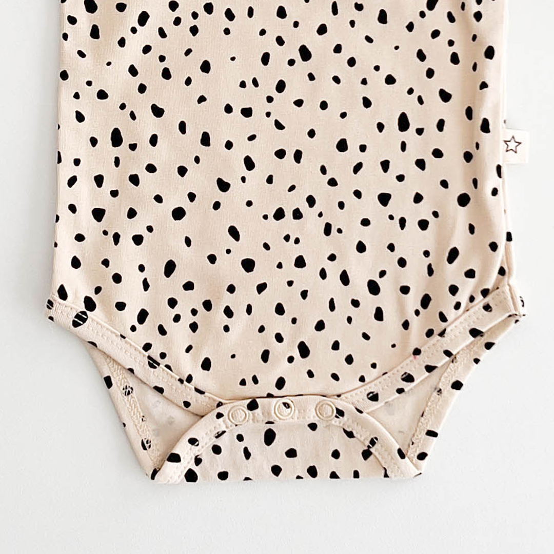 BEIGE BLACK PRINTED ONESIE