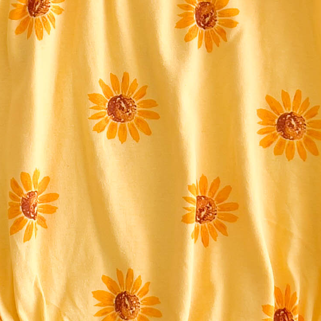 YELLOW SUNFLOWER PRINTED ONESIE