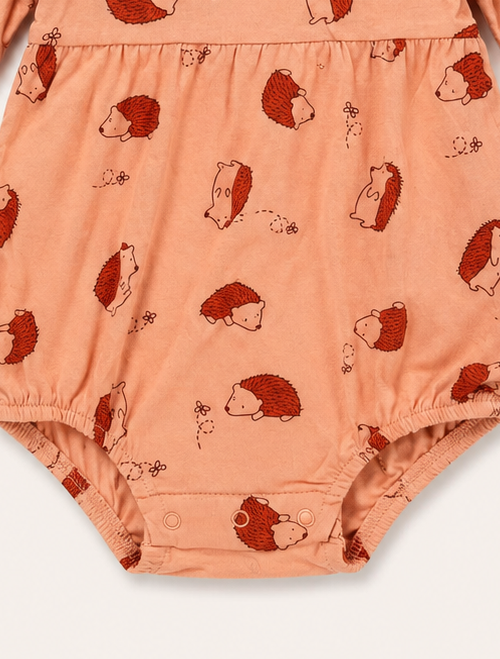 ORANGE PRINTED RUFFLE ONESIE