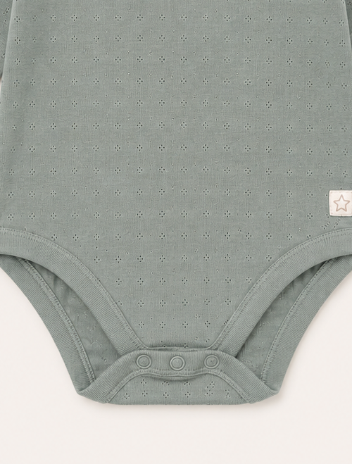 Sage green pointelle ruffle onesie