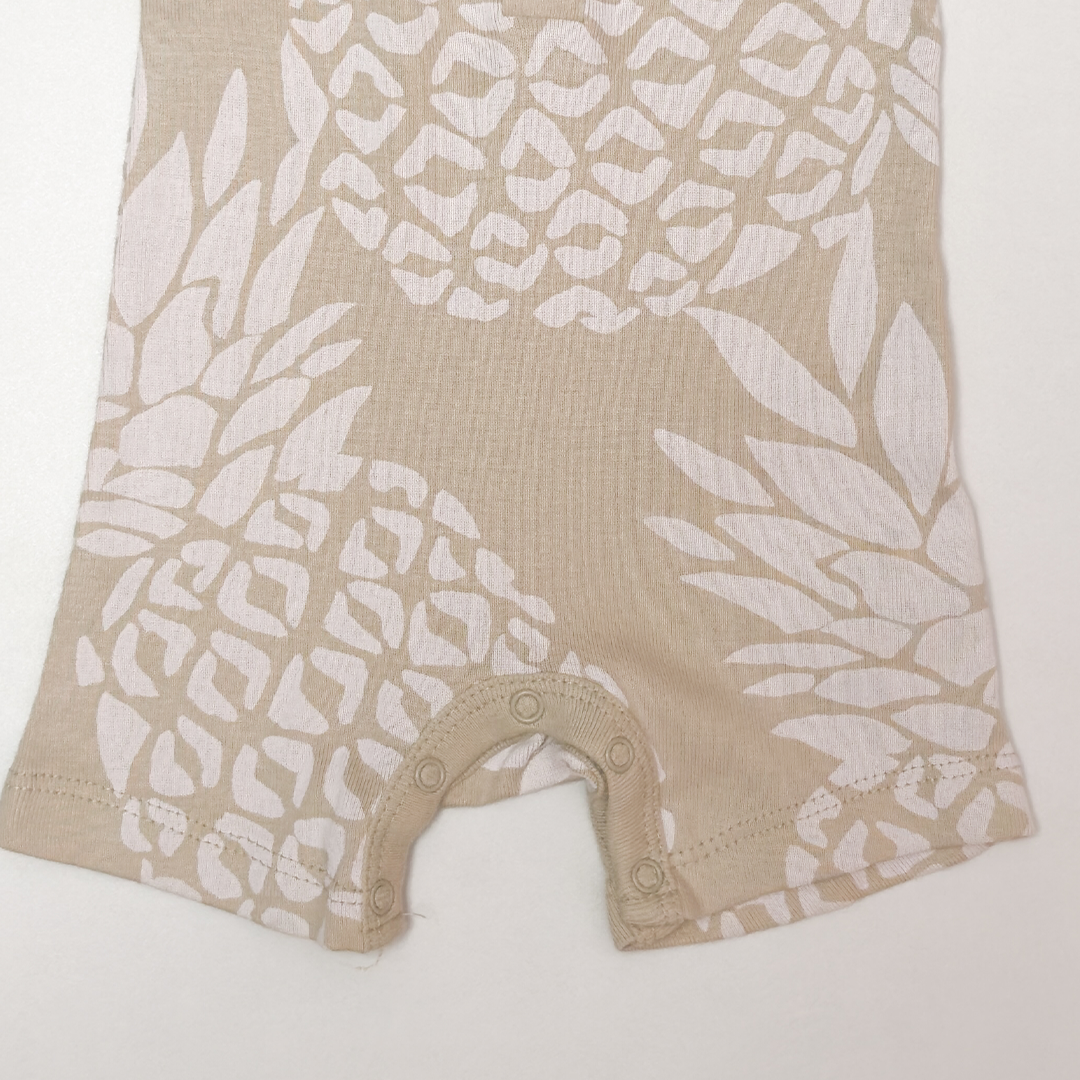 CREAM PRINTED SLEEVELESS JUMPSUIT