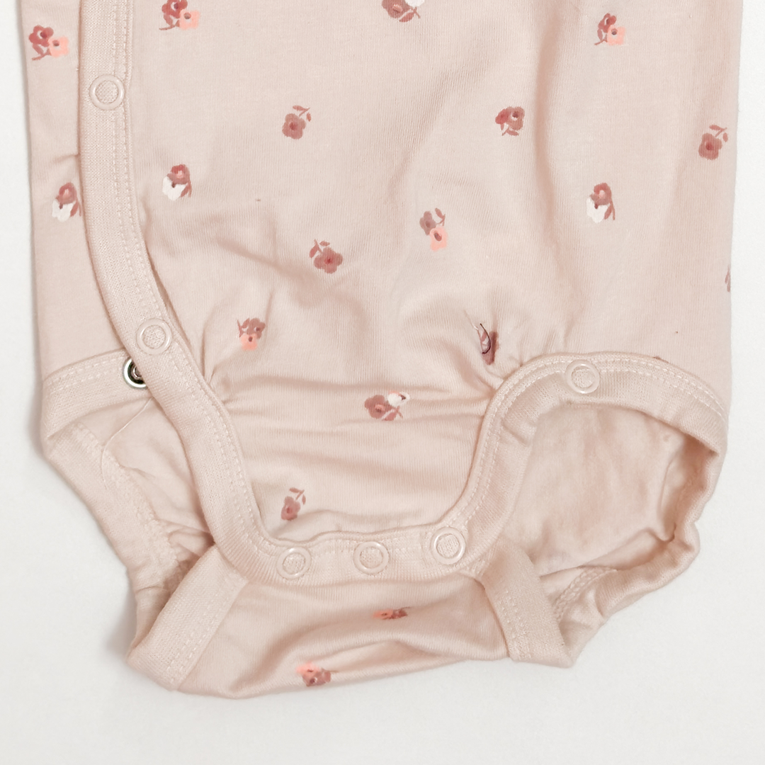 BEIGE FLORAL WRAPOVER ONESIE